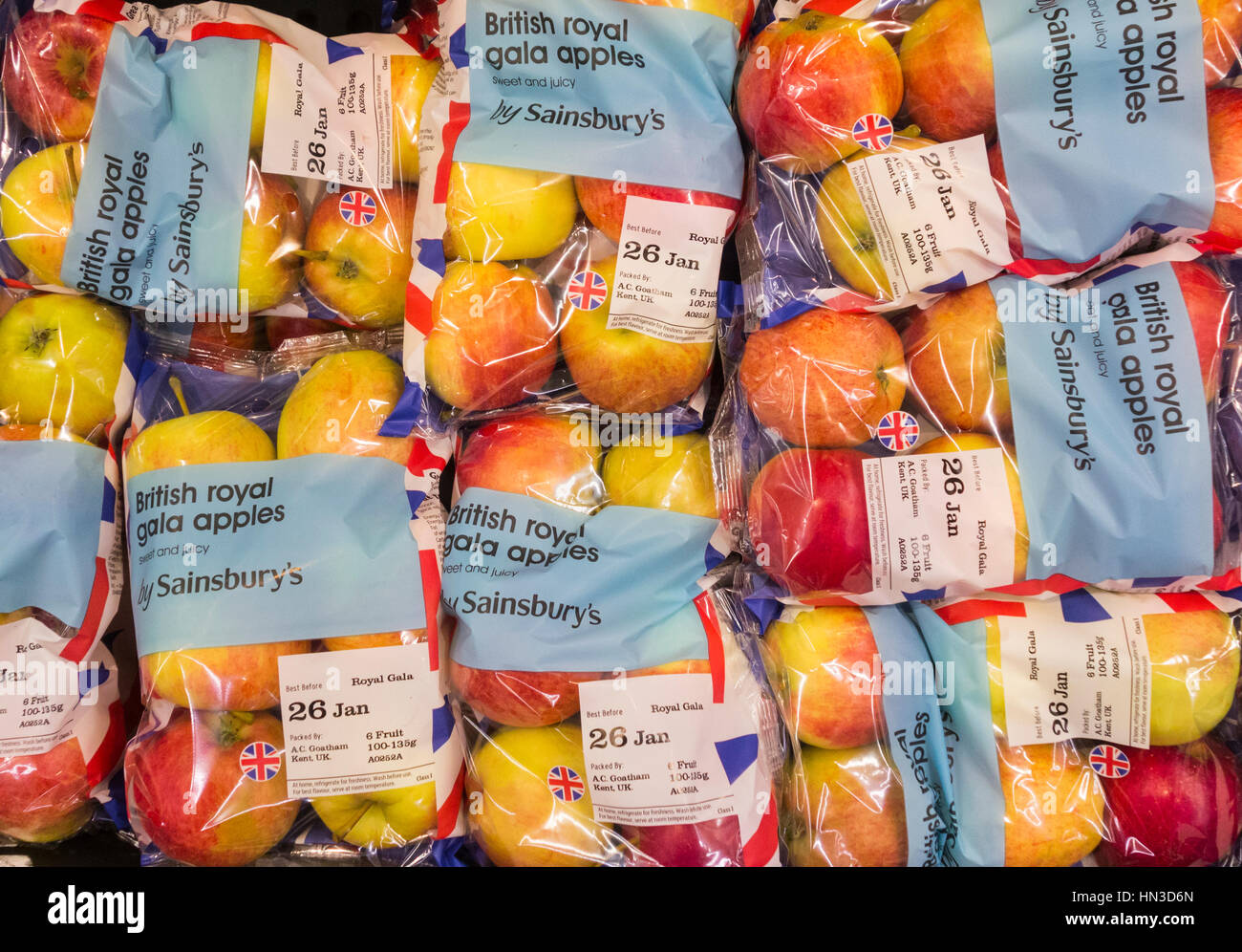 Royal Gala Apples in plastic packaging in Sainsbury`s supermarket. UK